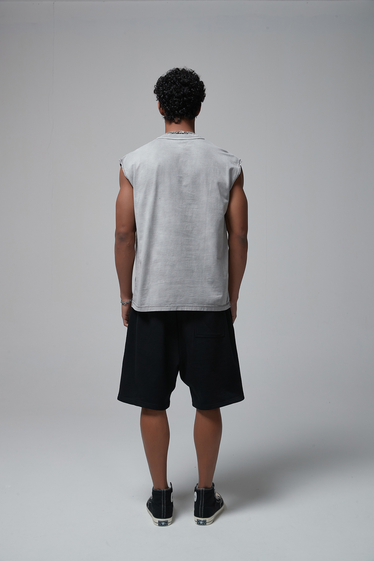 Boxy Raw-Edge Sleeveless T-Shirt – fabric and construction detail